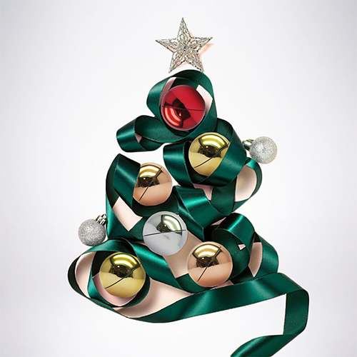 christmas tree made from green ribbon with cosmetics packaging ball pots as baubles