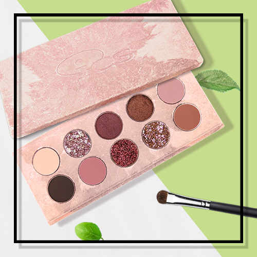 pink biodegradable sustainable palette plant-derived material packaging material green beauty eyeshadow sparkles with brush and leaves